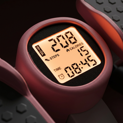 Digital fitness tracker with screen displaying steps, calories, time, and date on a dark background.
