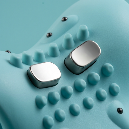 Two metallic buttons on a textured blue surface