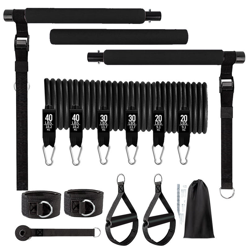 Black resistance band set with various attachments on a white background