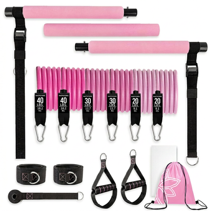 Pink resistance band set with various attachments on a white background