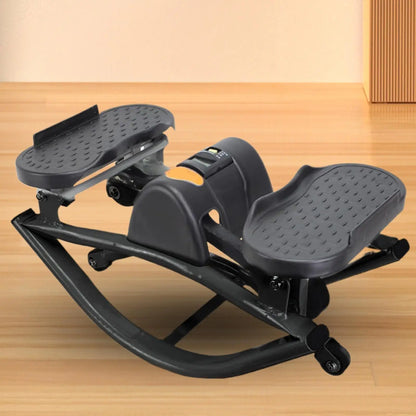 Black exercise device on a wooden floor