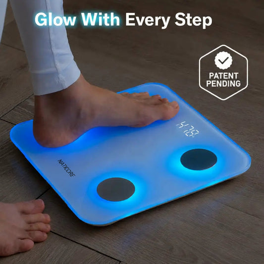 Person stepping onto a glowing smart scale with 'Glow With Every Step' text and patent pending logo.