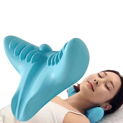 Blue shark fin-shaped neck pillow being used by a person on a white background