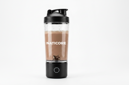 A portable electric shaker bottle with a black lid and base, containing a brown liquid, shown on a clean white background.